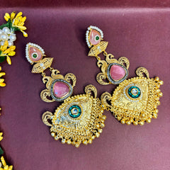 Sunaina: Golden Statement earrings