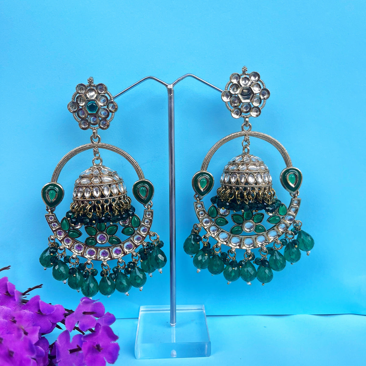 Aadhvi: Green Long Kundan Earrings with a Jhumka Motif